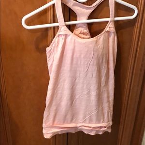 Light pink shelf bra workout tank